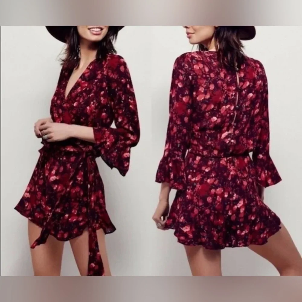 Free People All The Right Ruffles in Wild Moon Floral Romper Size XS OB397455.